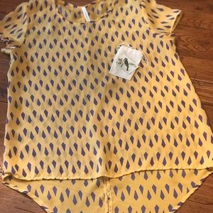 Teenplo yellow patterned shirt. Small